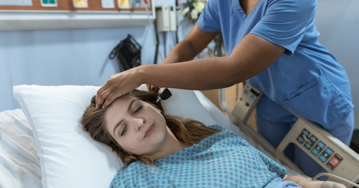 Nurse practitioner reviewing patient chart in Texas clinic